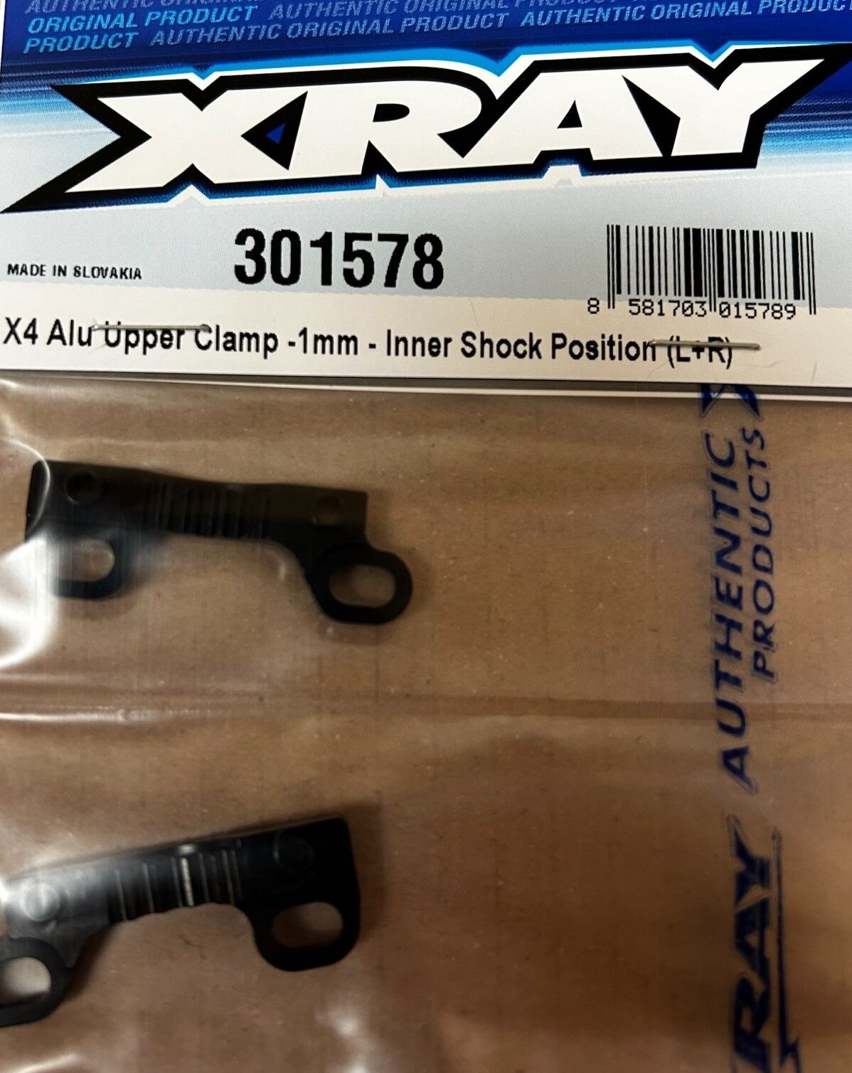 XRAY X4-2024 Aluminium Bulkhead Oben -1mm Dämpferposition Innen